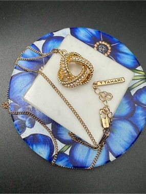 T Tahari knot and crystal pendant necklace #576 gold tone